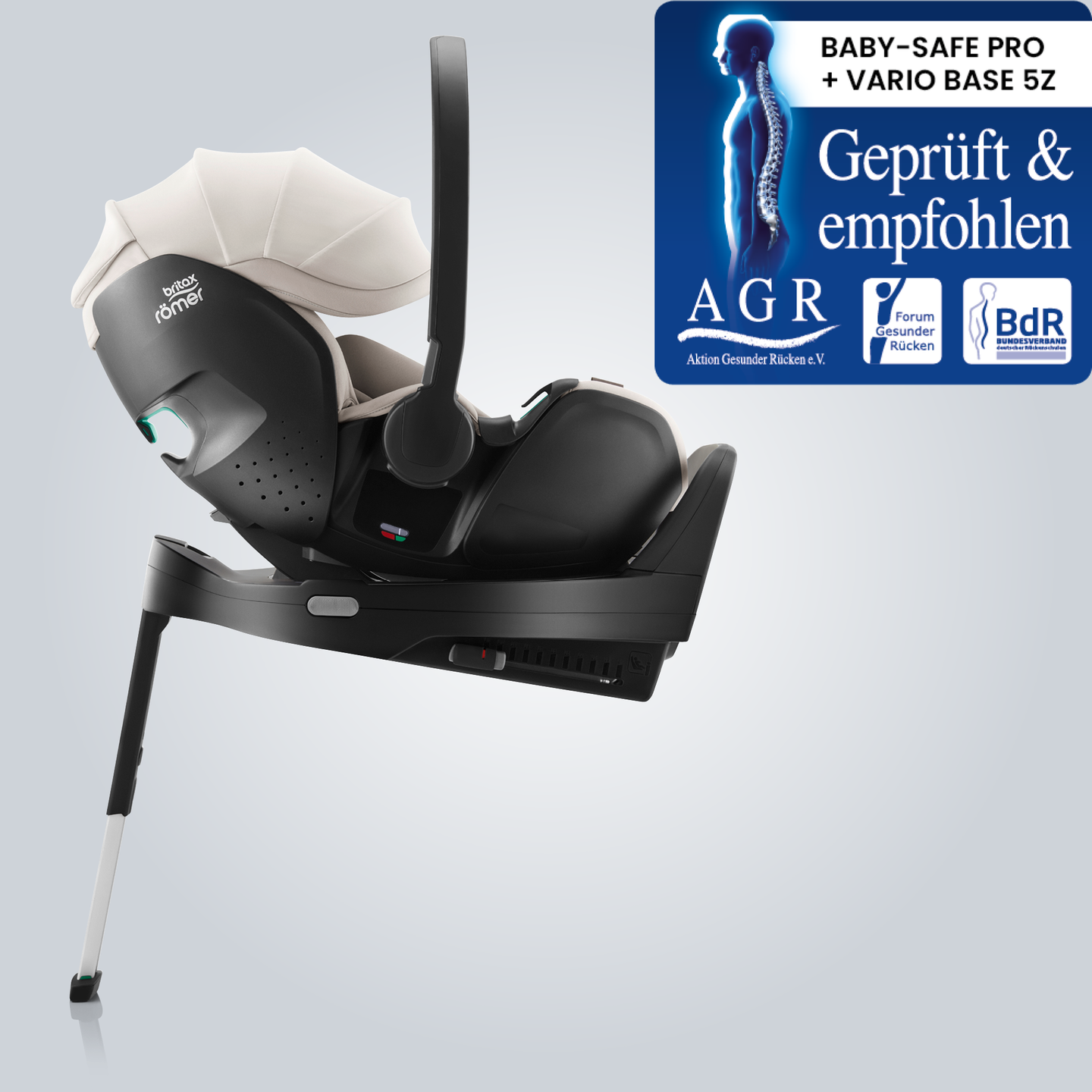 BABY-SAFE PRO infant carrier in Soft Taupe, mounted on an ISOFIX base with support leg, shown in side view with the Aktion Gesunder R&uuml;cken e.V. &ldquo;Tested & Recommended&rdquo; badge.